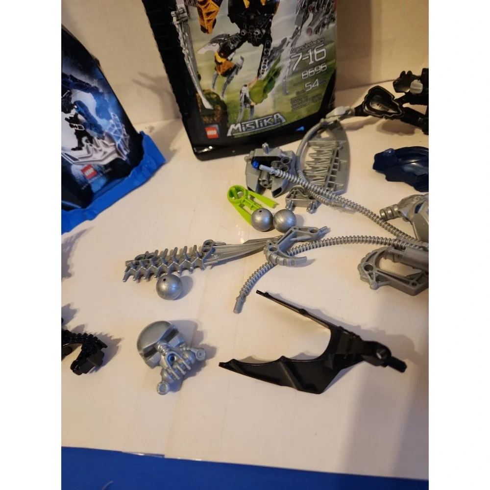 LEGO BIONICLE Mistika Gavla LOT- Masks, Weapons, misc parts Cases Manuals